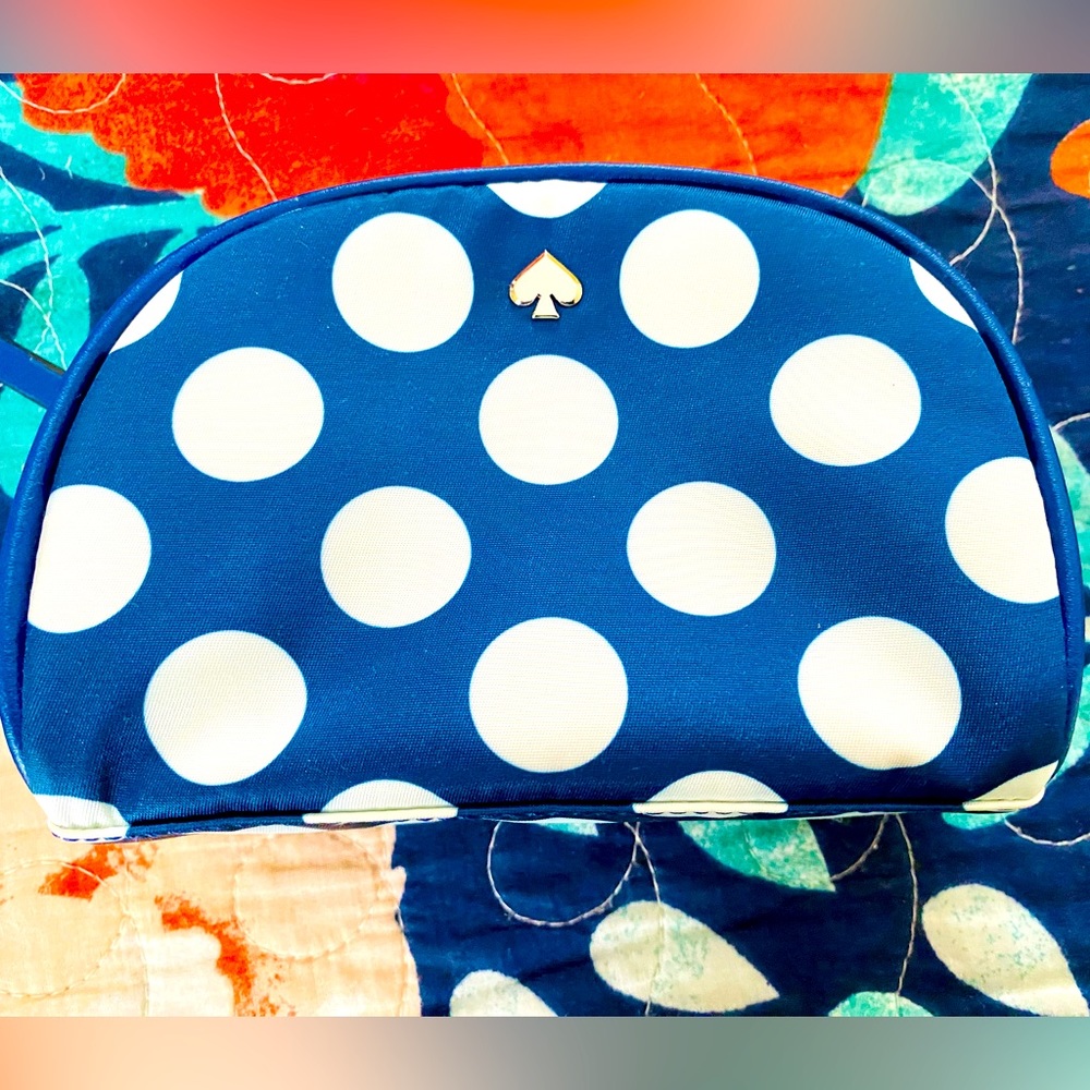NWT Kate Spade dome cosmetic purse.  Blue and white polka dots.